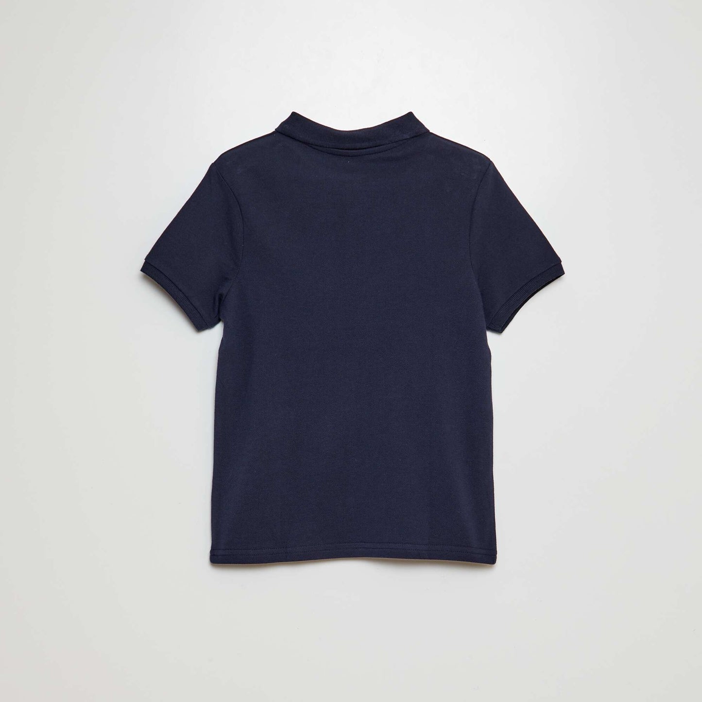 Polo uni en maille piquée MARINE