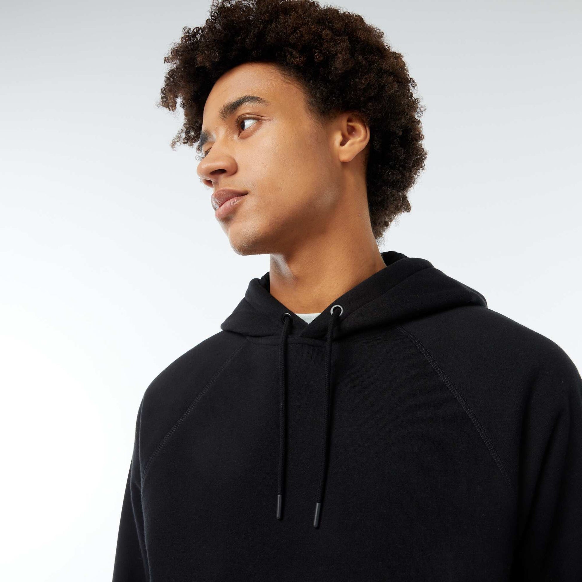 Sweat uni à capuche avec poches zippées NOIR