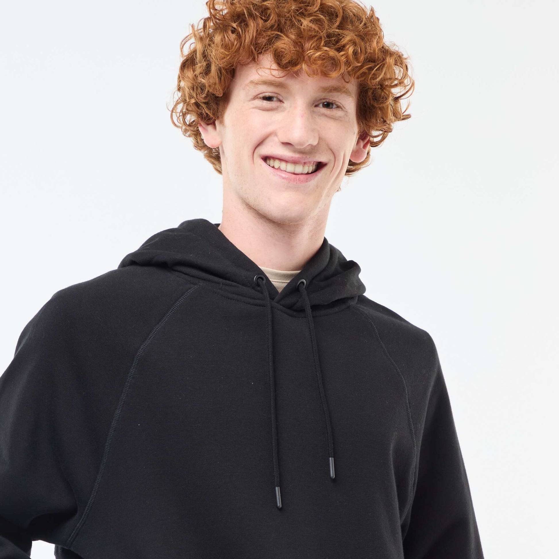 Sweat uni à capuche avec poches zippées NOIR