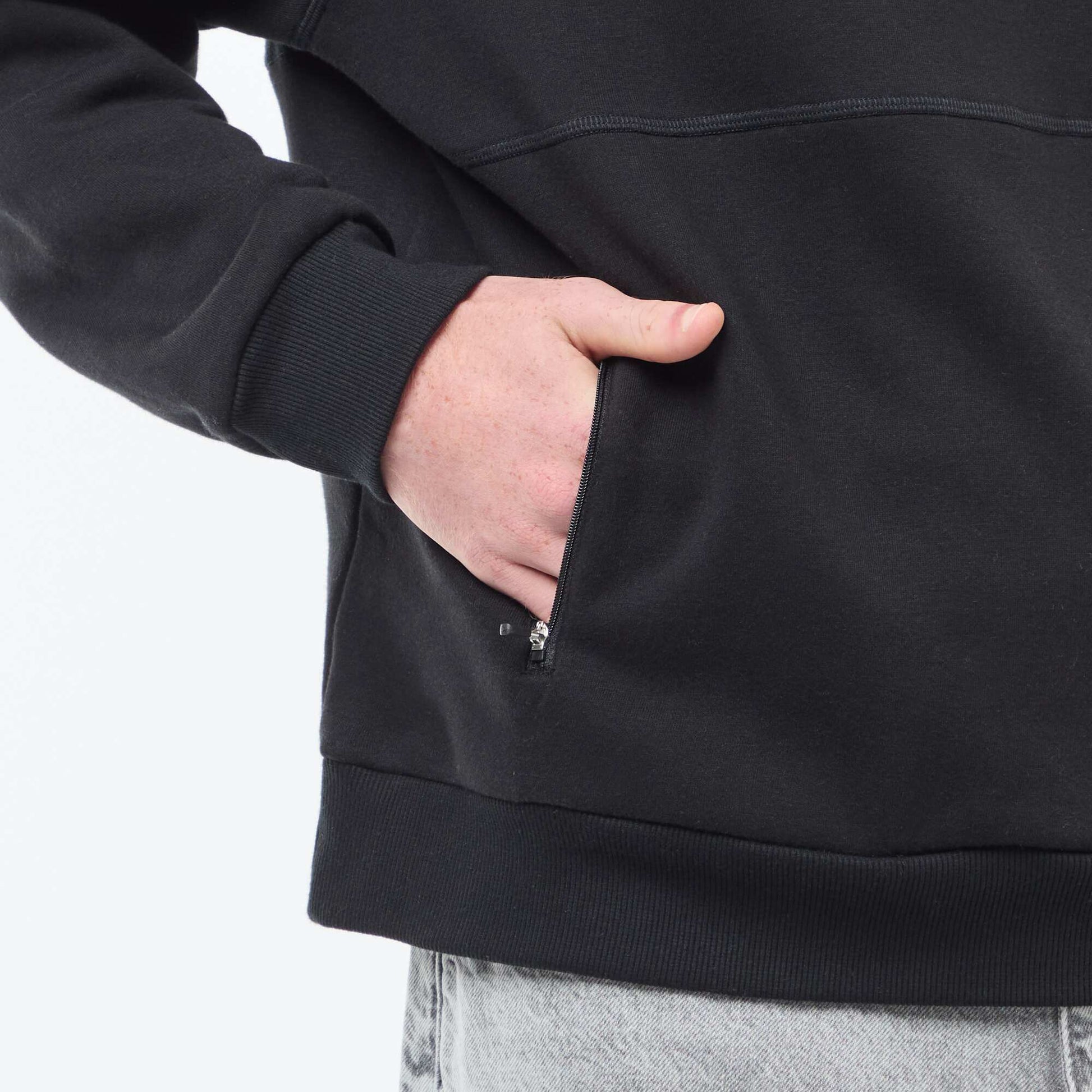 Sweat uni à capuche avec poches zippées NOIR