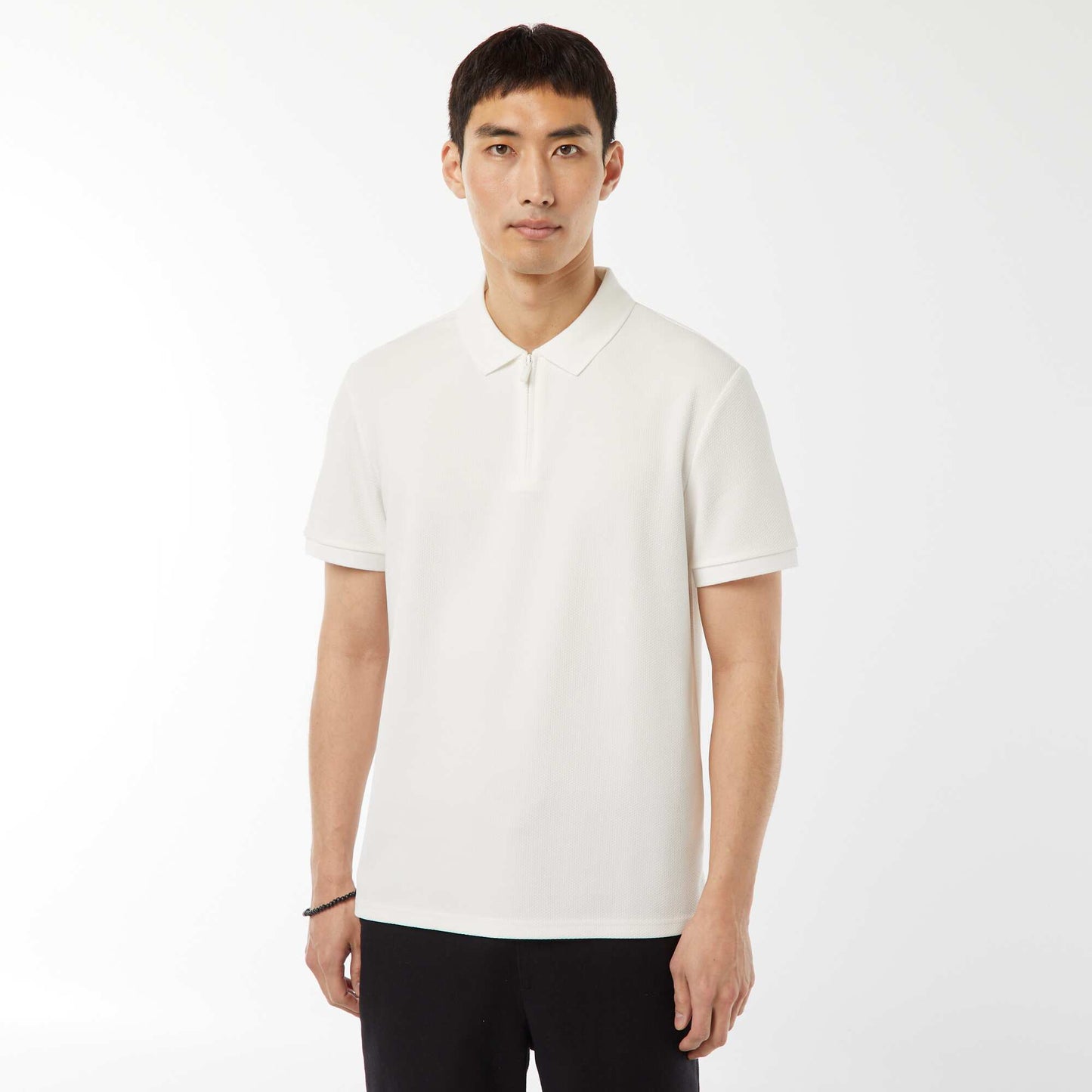 Polo en nid d'abeilles et col zippé BLANC