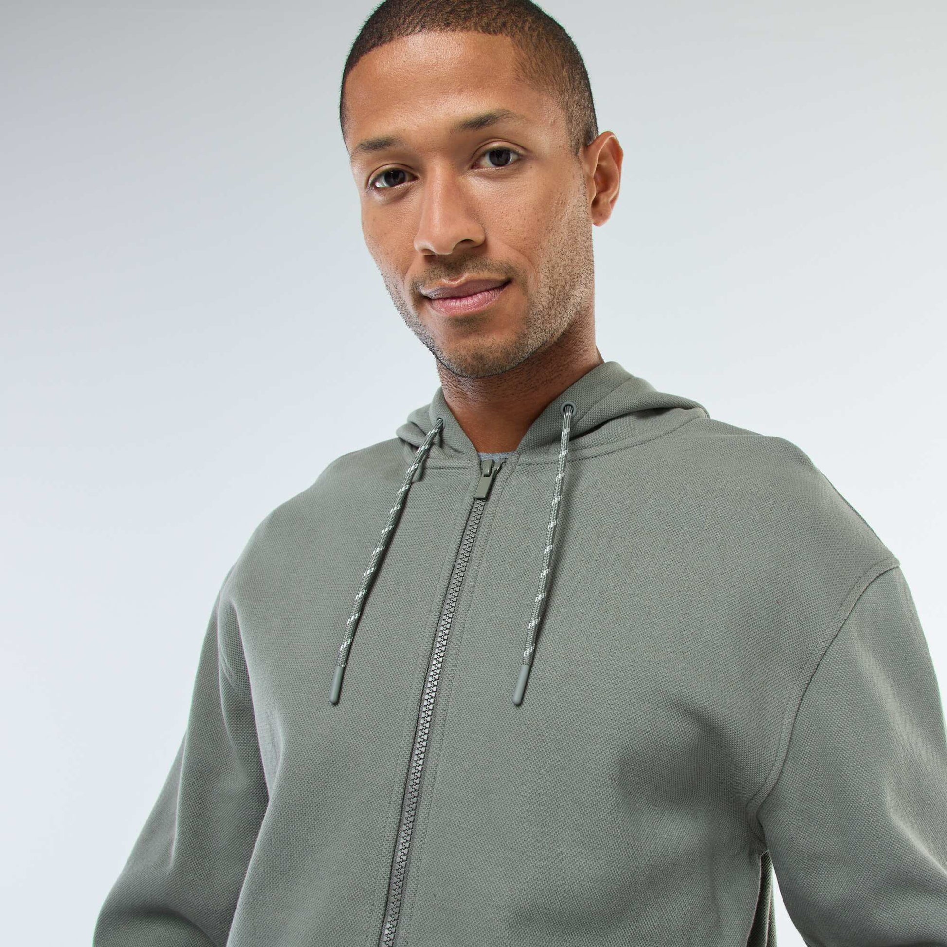 Sweat uni en maille piquée à capuche VERT