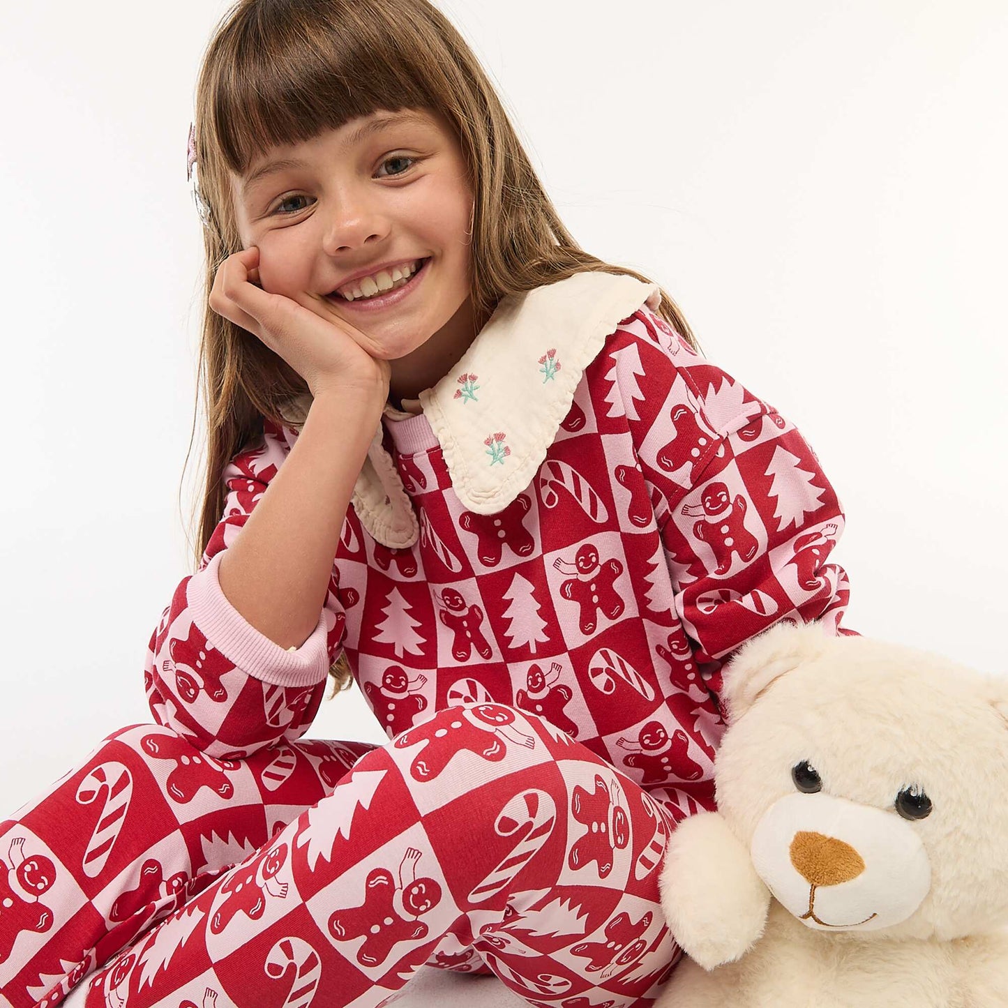 Pull de Noël à motif all-over en coton ROSE