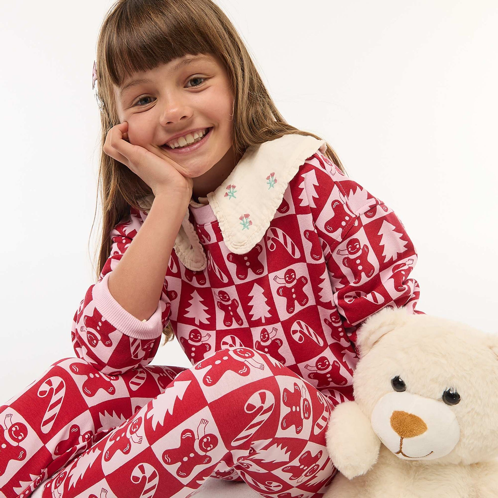 Pull de Noël à motif all-over en coton ROSE
