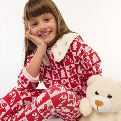 Pull de Noël à motif all-over en coton ROSE